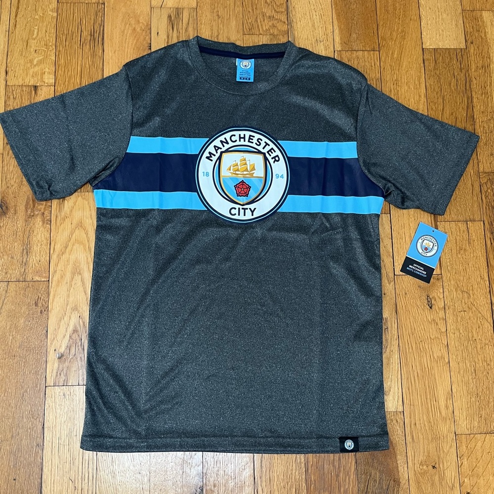 Official Manchester City sport shirt. Never worn. Mens size M.